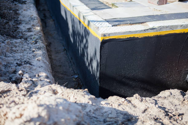 Professional Emergency Waterproofing technician working in Akron, NY